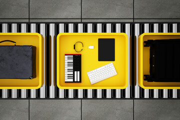 Comprehensive Array of Electronic Devices Luggage in Airport Security Tray.