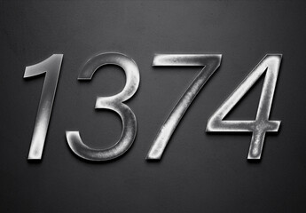 Chrome metal 3D number design of 1374 on grey background.