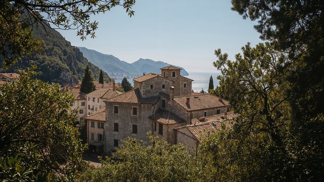 Scenic old stone buildings surrounded by nature and a calm waterfront
