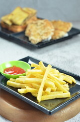 Plates of French fries with ketchup, a mesmerizing of crispy, golden and highlighting each fry's perfect texture and irresistible appeal