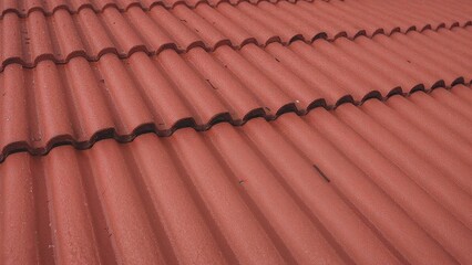 Close perspective of a metal panel roof featuring an interlocking configuration to ensure enhanced toughness and resistance to weather.