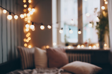 Fairy lights in cozy room, bokeh lights