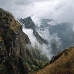 Mountaintop view misty valley, cloud cover, hiking path, scenic landscape