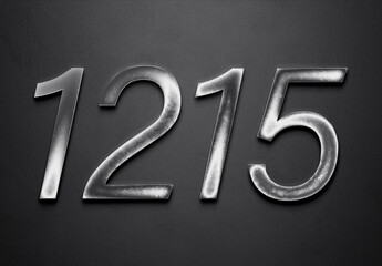 Chrome metal 3D number design of 1215 on grey background.