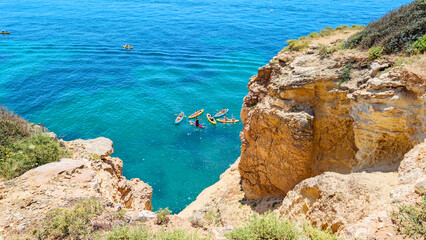 Tourists swimming on kayak, to Algarve , Portugal. 
