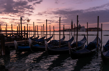 Amazing sunrise on the Grand Canal in Venice.The Church San Giorgio Maggiore on the background