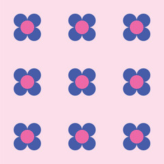 Flower pattern created from purple and bright pink circles on a pale pink background