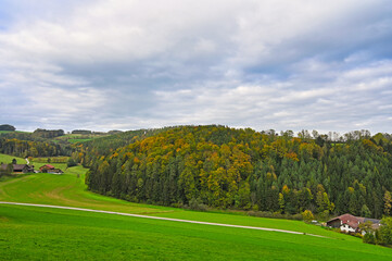 Landscape in Lower Austria with fields, forest, hills and farms,autumn season,Austria