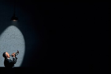 Dramatic Spotlight on Jazz Musician Playing Trumpet Against Dark Background in Minimalist Setting for Expressive Performance Art