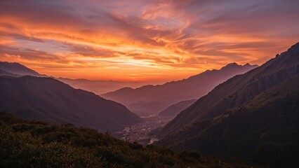Mountain Valley Illuminated by Orange Sunrise