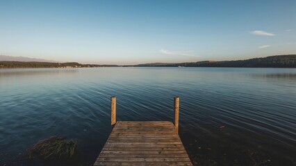 Fototapeta premium Peaceful lake scene seen from a wooden dock