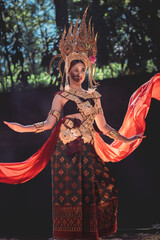 Scary halloween devil dance performance forest clearing cultural art enchanting atmosphere...