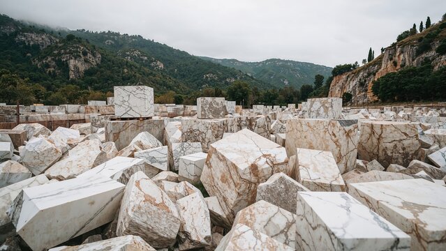 Marble mining location crowded with rocky blocks.
