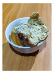 Bakpia is a cake made from a mixture of green beans and sugar which is coated in flour and shaped into flat rounds, then baked. Bakpia is a typical food from Yogyakarta, Indonesia