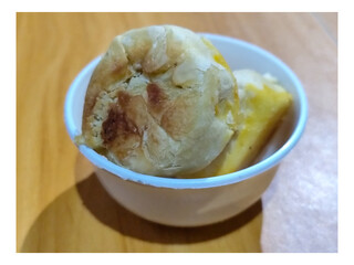 Bakpia is a cake made from a mixture of green beans and sugar which is coated in flour and shaped into flat rounds, then baked. Bakpia is a typical food from Yogyakarta, Indonesia