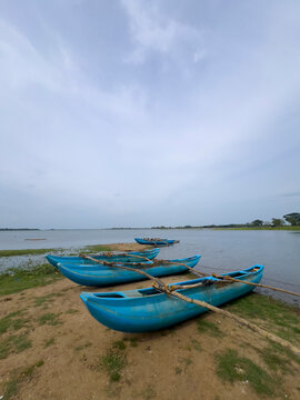 boat on a lake parakrama samudraya in sri lanka 
