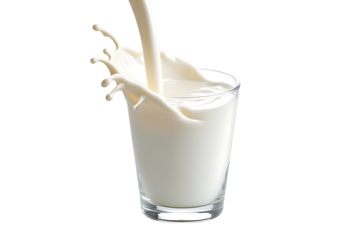 Fresh milk pouring into a glass for a healthy dairy drink