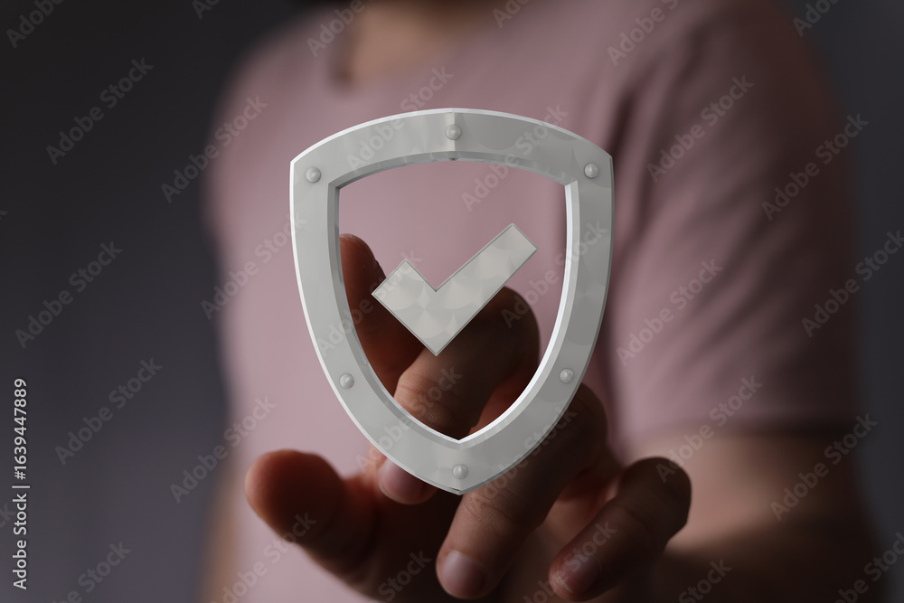 Poster image of a hand interacting with a digital shield icon, representing data security and online protec
