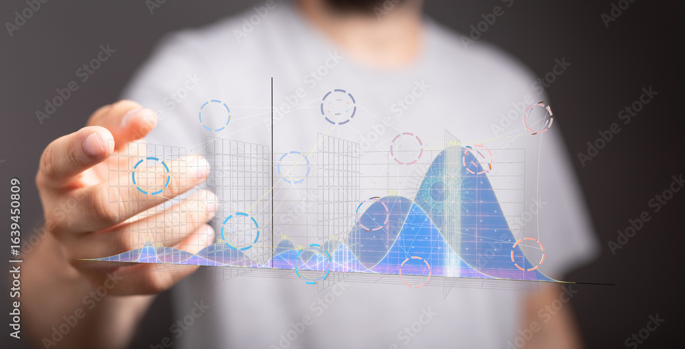 Poster image of a man interacting with holographic charts and graphs, visualizing data analysis and busines