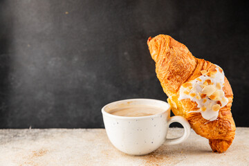 Croissant almond freshly baked sweet dessert tasty snack fresh delicious gourmet food background on...