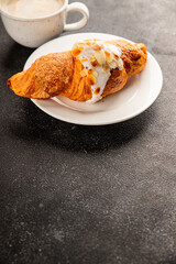 Croissant almond freshly baked sweet dessert tasty snack fresh delicious gourmet food background on the table  rustic food top view copy space