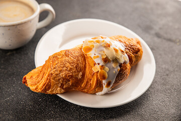Croissant almond freshly baked sweet dessert tasty snack fresh delicious gourmet food background on the table  rustic food top view copy space