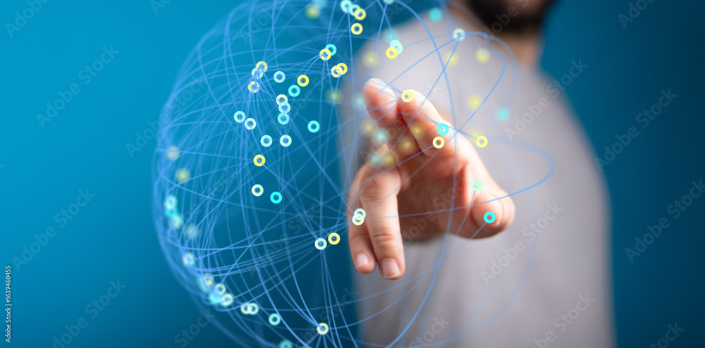 Poster hand interacting with a digital global network, showing data connections and interactions.