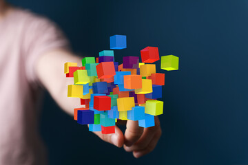 Abstract image of colorful blocks floating, symbolizing data, innovation, and technology. Ideal for...
