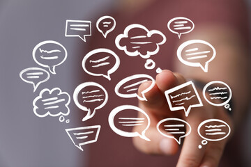 Abstract image of speech bubbles around a hand, symbolizing communication, dialogue, and connection.
