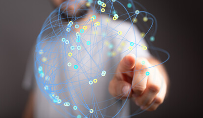 Abstract image of a hand interacting with a digital network.  Represents connection, technology,...