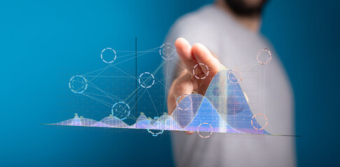 Businessman interacts with digital charts, showing data analysis and growth trends. Perfect for technology, finance, and business concepts.