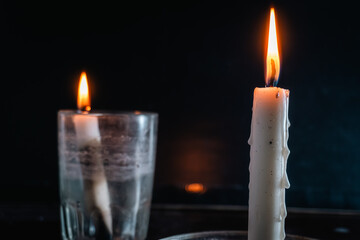 Warm candlelight evokes quiet reflection and intimate moments of peace and serenity indoors