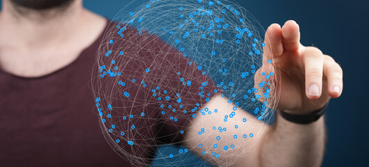 Person touches a digital globe, showcasing global connection and network data visualization.