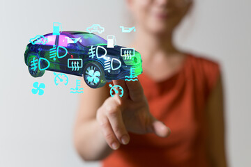 Woman interacts with a digital car dashboard displaying maintenance and diagnostic indicators.