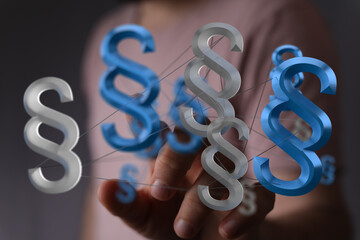 Abstract image of interconnected paragraph symbols representing legal concepts, justice, and...