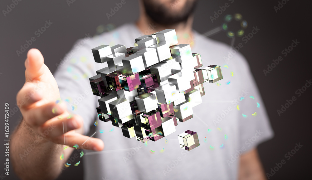 Poster abstract image of a man interacting with a 3d holographic data cube. perfect for technology, innovat