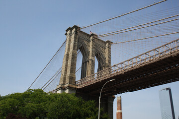 Fototapeta premium Brooklyn Bridge from below - New York City - USA - 2019 - Adobe Stock