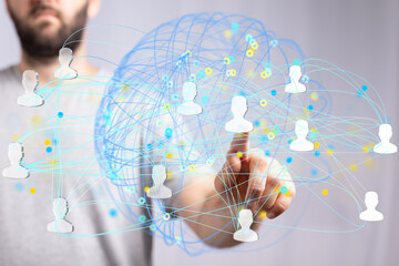 Image of a person interacting with a digital network, symbolizing connection and collaboration.