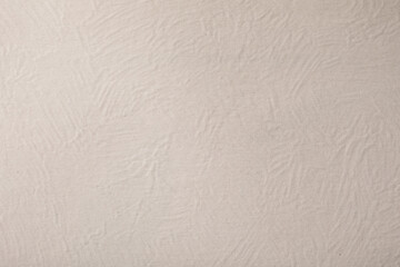 High-resolution image of a light beige textured paper background. Perfect for design projects.