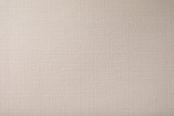 High-resolution image of a light beige textured paper background. Perfect for design projects.