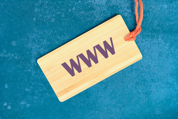 Internet business typography quotes concept. WWW World Wide Web on a card with a string