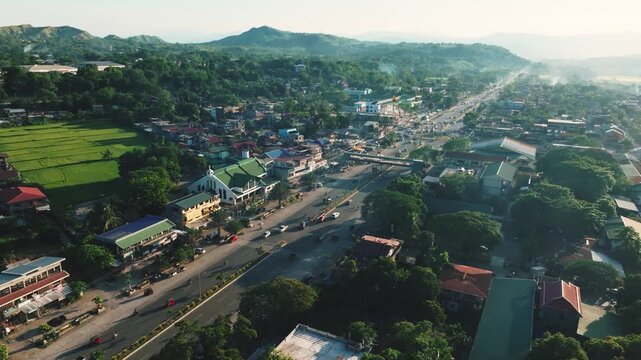 4K Aerial View Of Tabuk City, The Rice Granary of the Cordillera, Kalinga, Philippines
panoramic views of city streets, buildings, and the expansive agricultural landscapes