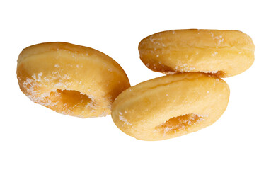 Side view of three brown sugar glazed cinnamon donuts in stack isolated on white background with...
