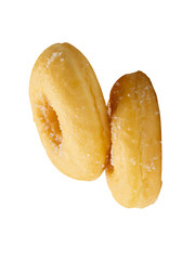 Side view of two brown sugar glazed cinnamon donuts in stack isolated on white background with clipping path