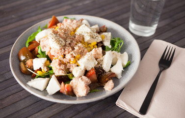 Closeup of salad with fish and vegetables for lunch