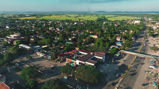 4K Aerial View Of Tabuk City, The Rice Granary of the Cordillera, Kalinga, Philippines
panoramic views of city streets, buildings, and the expansive agricultural landscapes