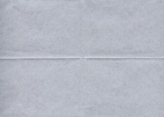 Folded rough paper texture background.	
