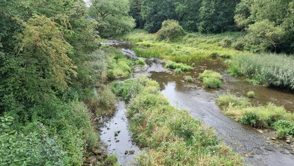 weir at haltern reservoir with blue bridge