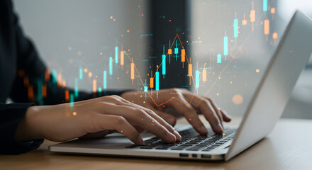 A business person analyzing a stock market candlestick chart on a laptop with a futuristic holographic display. A concept for financial investment, trading, data analysis, and economic growth.