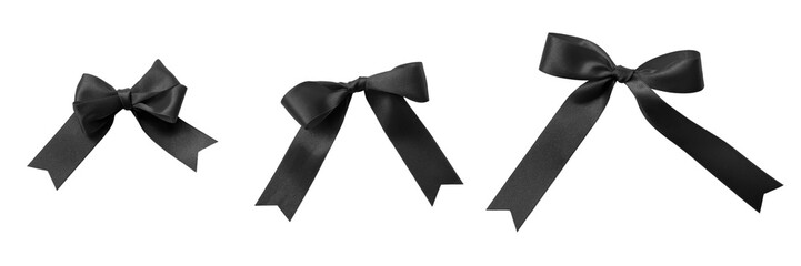 Black bow ribbon satin fabric band knot tied (png isolated on transparent background) for funeral...